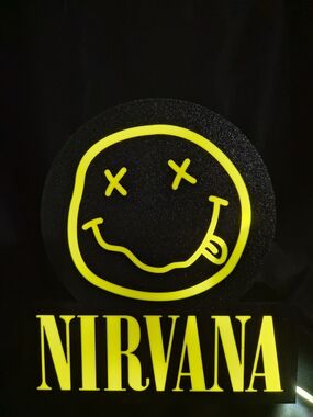 NIRVANA Black Sign with Neon Yellow Smiley Logo